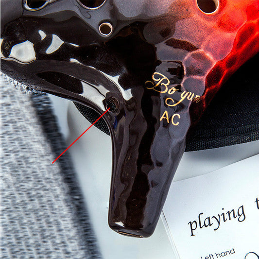 KTX-896147 Wave Pattern 12-Hole Pottery Flute for Enchanting Melodies