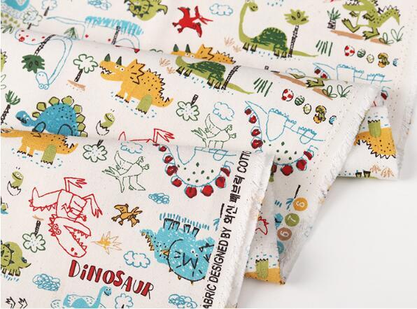 KTX-022035 Cotton Canvas DIY Fabric featuring Cute Cartoon Dinosaurs - Available in Blue and White, 110CMx45CM