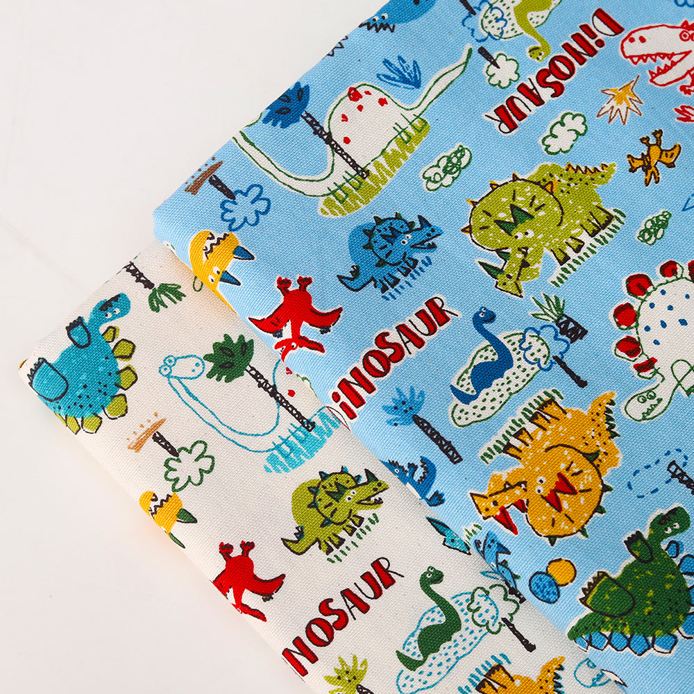 KTX-022035 Cotton Canvas DIY Fabric featuring Cute Cartoon Dinosaurs - Available in Blue and White, 110CMx45CM