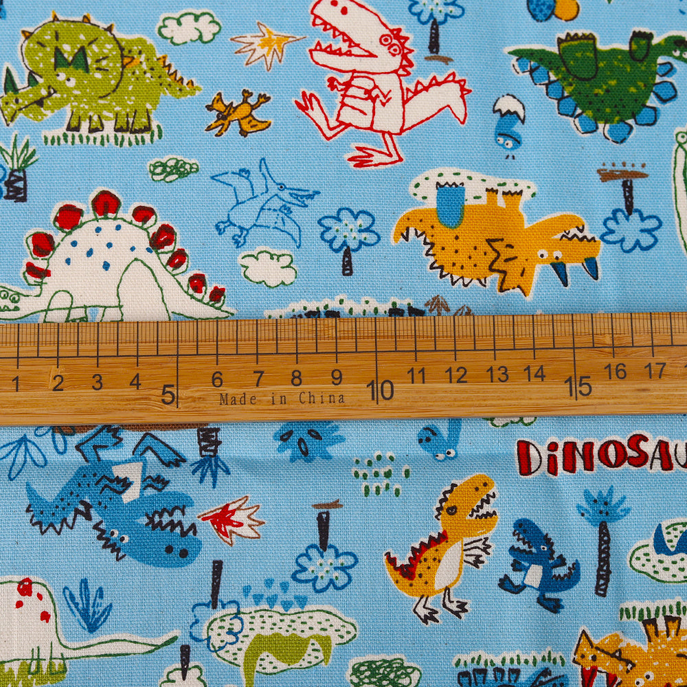 KTX-022035 Cotton Canvas DIY Fabric featuring Cute Cartoon Dinosaurs - Available in Blue and White, 110CMx45CM