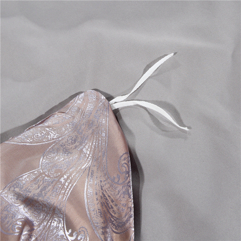 KTX-213139 Elegant Four-Piece Jacquard Bedding Set in Polyester Fiber - Quilt Cover, Sheets, and Pillowcases