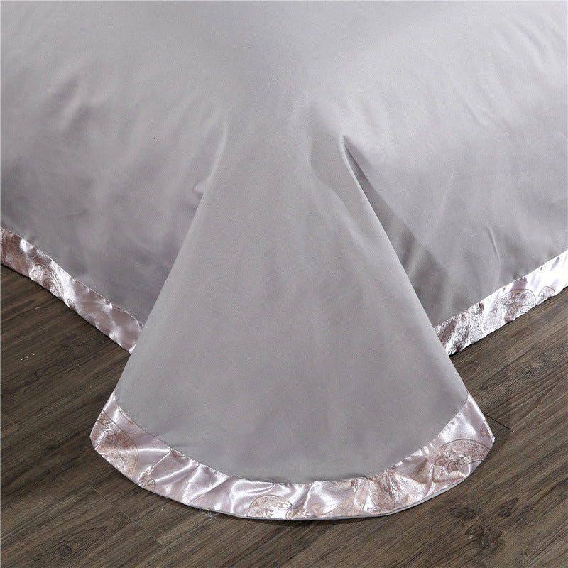 KTX-213139 Elegant Four-Piece Jacquard Bedding Set in Polyester Fiber - Quilt Cover, Sheets, and Pillowcases