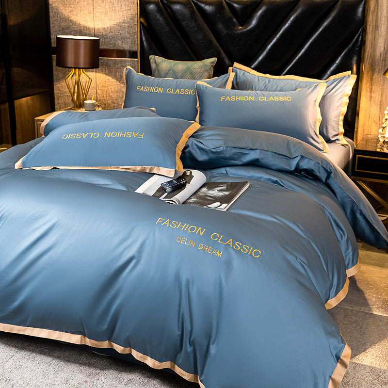 KTX-566227 Cotton Four-Piece Bedding Set with Embroidery Design and Personalized Fashion Elements