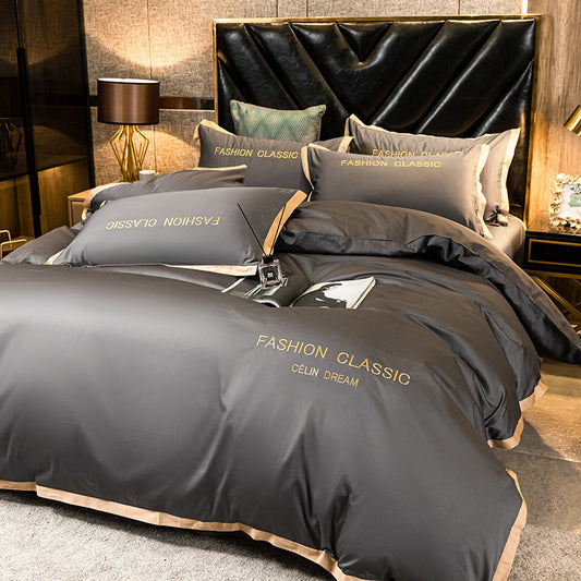 KTX-566227 Cotton Four-Piece Bedding Set with Embroidery Design and Personalized Fashion Elements