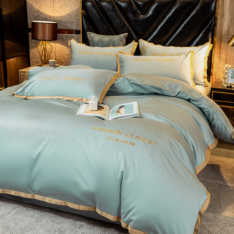 KTX-566227 Cotton Four-Piece Bedding Set with Embroidery Design and Personalized Fashion Elements